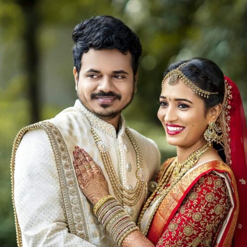 Joyful candid moment between engaged couple outdoors