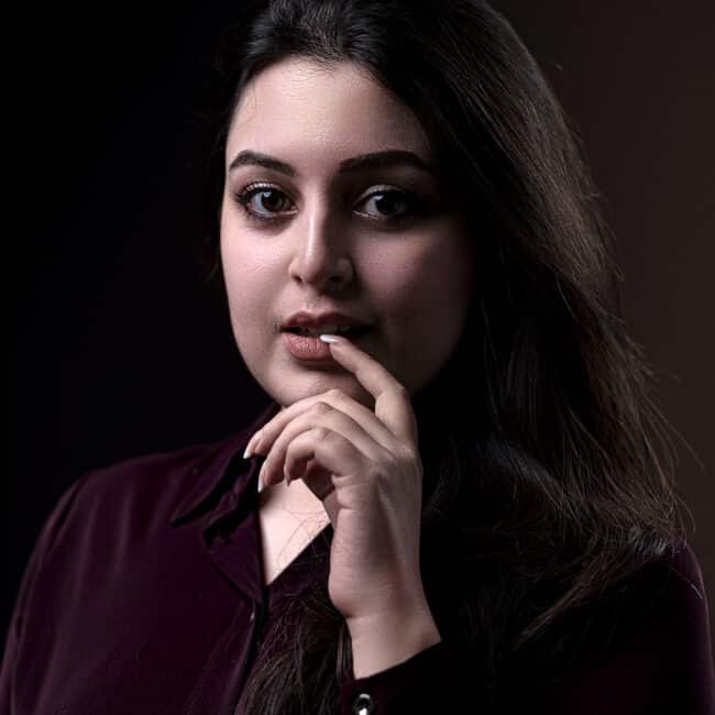 Female model during lookaway portrait practice in studio training