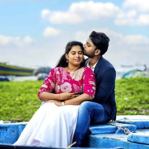 Couple enjoying candid moments during lakeside shoot