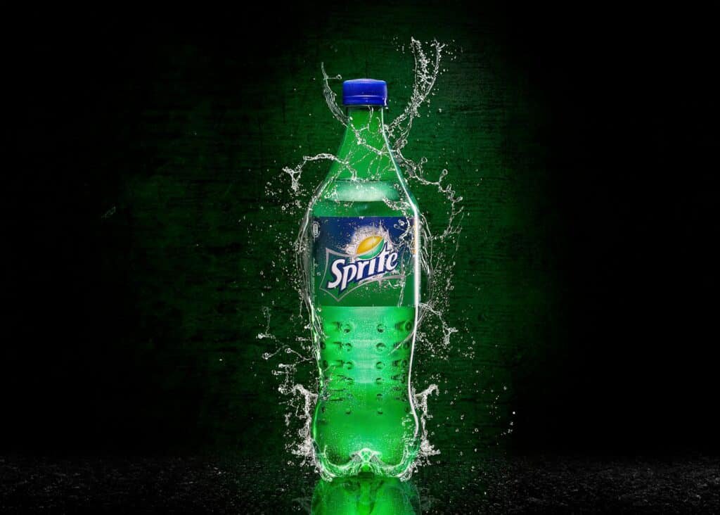 Sprite bottle photo captured with cinematic lighting and dark background for product photography